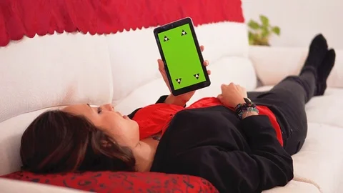 Woman chilling on the couch  Stock Footage 78992289