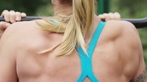 Woman Chinups Back Closeup Panning - 4k - Slow Motion Stock Footage 59744066