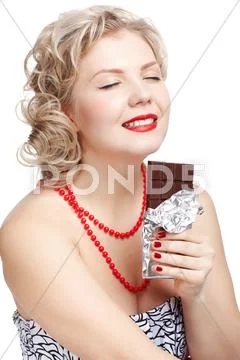 Woman with chocolate bar Stock Photos