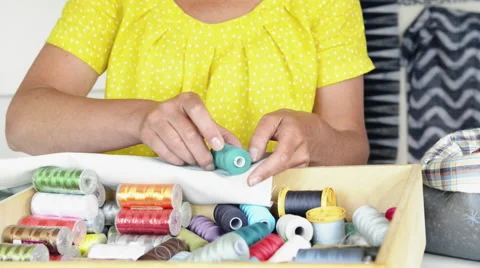 Woman choosing thread Stock Footage