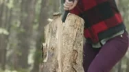 Woman Chopping Wood In Forest Stock Footage