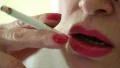 Woman with a cigarette, close up shot HD Footage