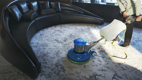 Woman cleaner using polishing machine to clean floor Stock Footage 168599868