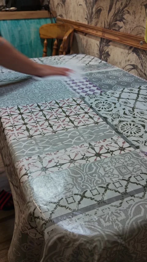 Woman Cleans Kitchen Table in Vertical Household Chore Clip Today 库存影片 341669608