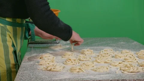 Woman cleans the table after setting the cutters - green screen background Stock Footage 126239341