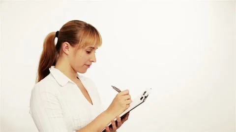 Woman with clipboard taking notes Stock Footage 7903675