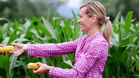 Woman with a cob Stock Footage 112759563