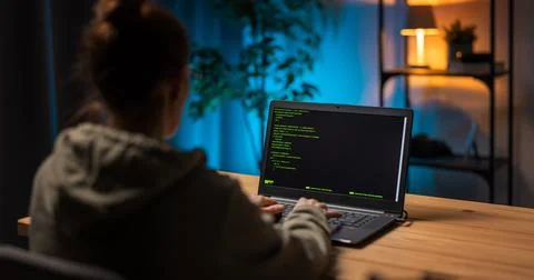 Woman coding html on laptop Stock Photos