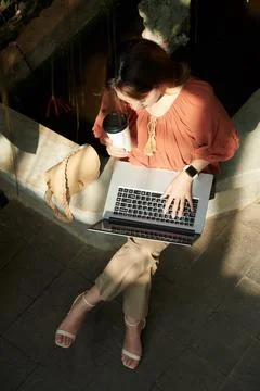 Woman with Coffee Coding Stock-Fotos