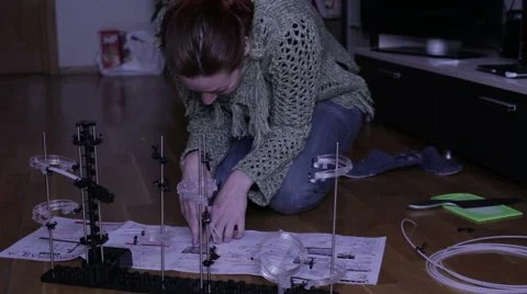 Woman collects Designer Stock Footage 59198403