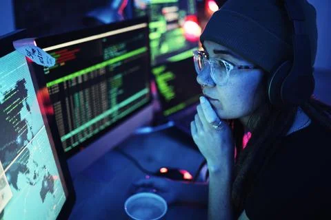Woman, computer and hacker thinking with headphones and programming for Foto stock
