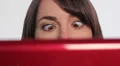 Woman at computer. Crossed eyes. HD Footage