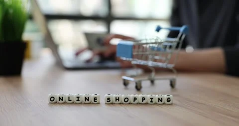 Woman with computer makes purchases on Internet Stock Footage 288078428