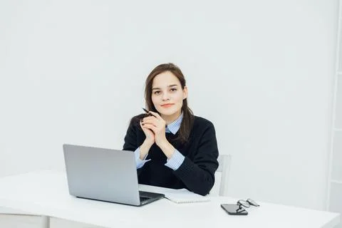 Woman at the computer in the office at a remote work Internet communication IT Foto stock