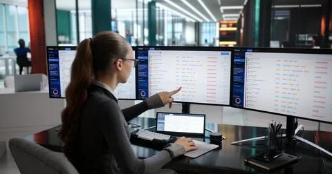Woman At Computer Solving Technical Issues Through Service Ticket System Effi Stock Photos