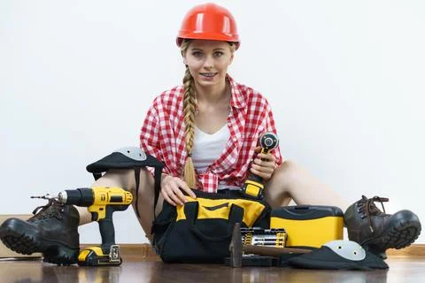 Woman constructive worker with tool bag Stock Photos
