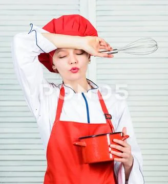 Woman in cook hat and apron. professional chef in kitchen. Cuisine. happy woman Stock-Fotos