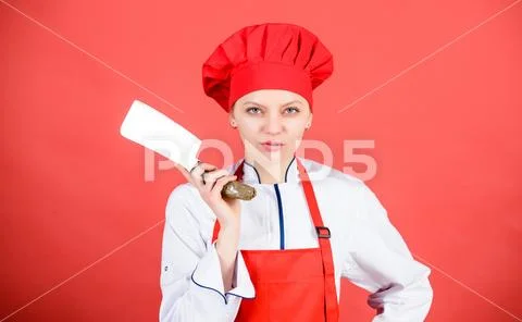 Woman in cook hat and apron. professional chef in kitchen. Cuisine. butcher cut Stock-Fotos