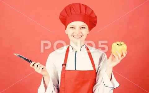 Woman in cook hat and apron. professional chef in kitchen. Cuisine. Housewife Stock-Fotos