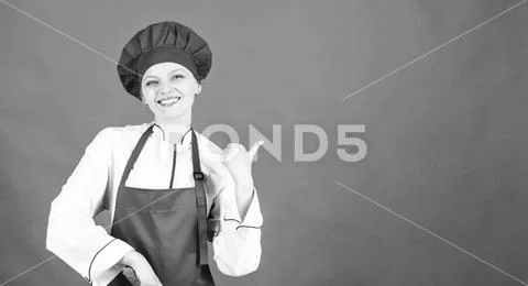 Woman in cook hat and apron. professional chef in kitchen. Cuisine. happy woman Stock-Fotos