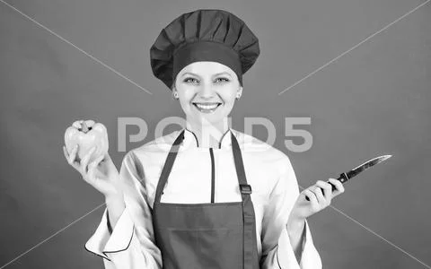 Woman in cook hat and apron. professional chef in kitchen. Cuisine. Housewife Stock-Fotos