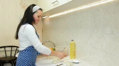 Woman Cooking Ingredients For Chebureks In The Kitchen Stock Footage