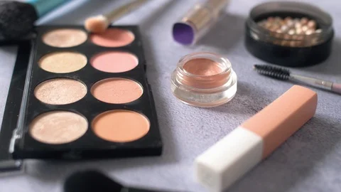 Woman cosmetics make up stuff on texture surface. Eye shadows palette and brushe Video stock 114294104