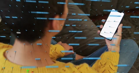 Woman on couch tapping smartphone, checking finance data with blue bars and 3D Stock Footage 333833473
