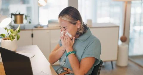 Woman, covid and sinus in office with sneeze, tissue and runny nose while Stock Photos