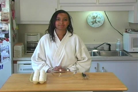 Woman Cracks an Egg, Sequence (2) Stock-Footage 351193