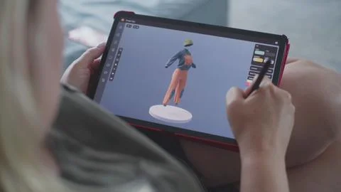 Woman creates 3D model using tablet computer and digital pen 写真素材