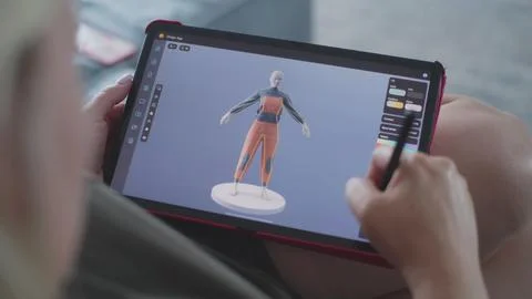 Woman creates 3D model using tablet computer and digital pen Stock Photos