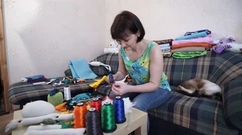 The Woman Creates Bright Multi-Colored Toys of Handmade Video stock 61156629