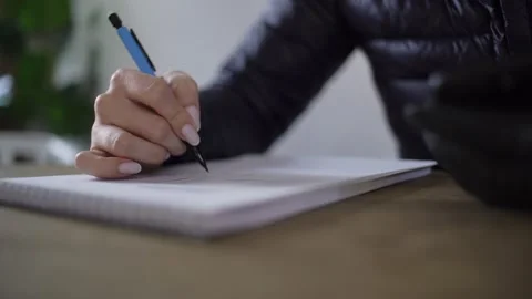 Woman creates a project, plan of apartment renovation on paper Stock Footage 139853181