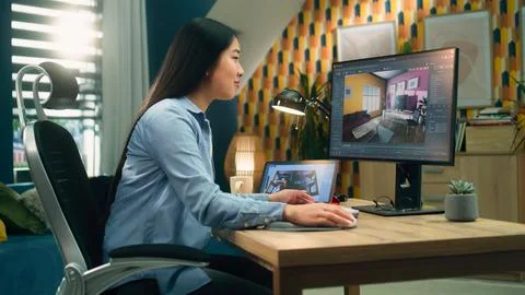 Woman creating 3D interior visualization 写真素材