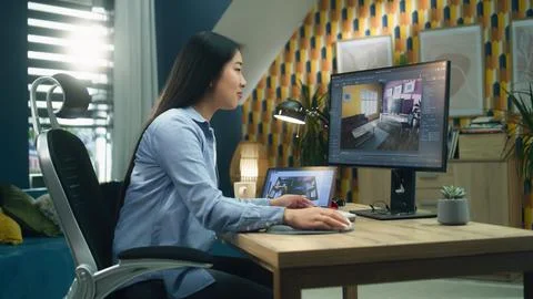 Woman creating 3D interior visualization 写真素材
