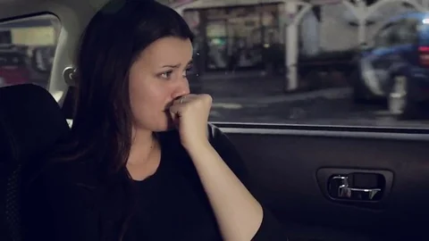 Woman crying after reading text message from boyfriend breaking up Stock Footage 69257277