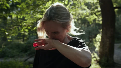 Woman Crying in the Forest Stock Footage 245436882