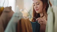 A Woman Customer Shopping For Luxury, Fashion Clothing And Looking At Designer Stock Footage