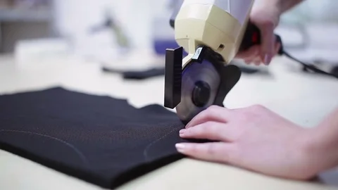 Woman cuts the tissue along an arc. Stock Footage