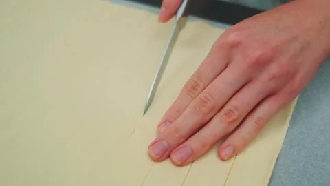 Woman Cutting Thin Strips of Puff Pastry Dough Indoors Stock Footage 342880765