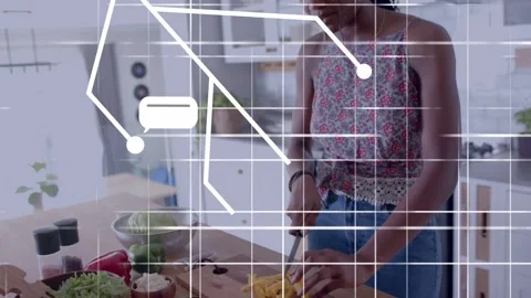 Woman cutting veg cooking, causing grid joining food to body, cam zooming out, Stock Footage 333817751
