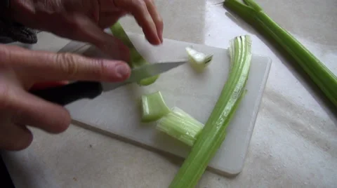 Woman cutting vegetables Stock Footage 34170376