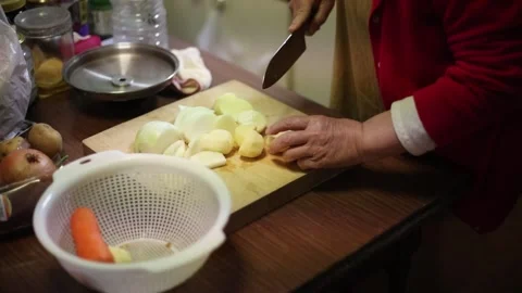 Woman cutting vegetables Stock Footage 277864112