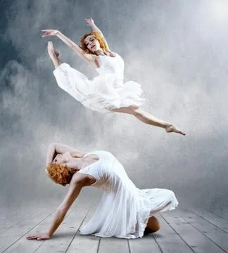 Woman dancer seating posing on background Stock Photos