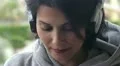 woman dances while listening music on her headphones HD Footage