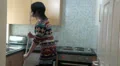 Woman dancing and sweeping the floor HD Footage