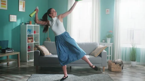Woman Is Dancing In Flat With Cleaning Tools Stock Footage 164731194