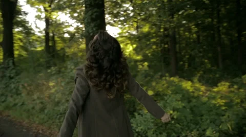 Woman dancing in the forest Stock Footage 32262183