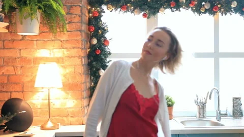 Woman dancing in the kitchen Stock Footage 114571772